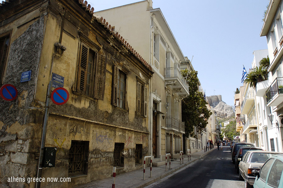View of Athens Greece street with Acropolis in far distance