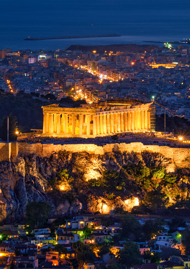 Parthenon lit up at night in Athens Greece