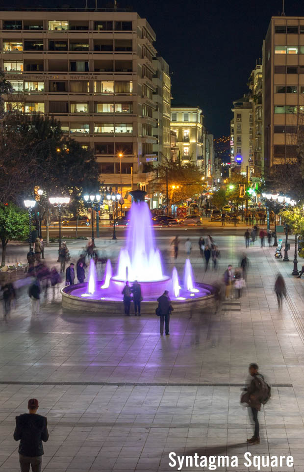 Night time at water fountain at Syntagma Square in Athens Greece
