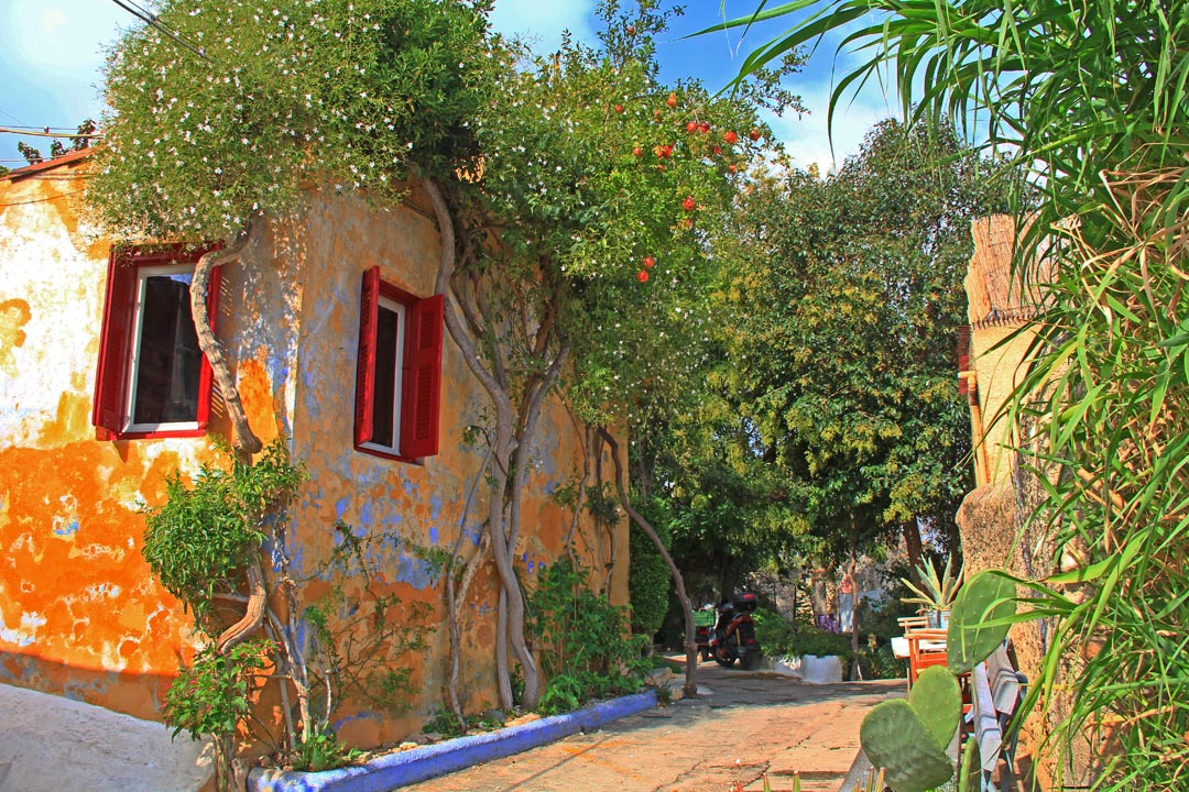 Beautiful traditional Greek home with multiple colors and age showing, Attika Greece