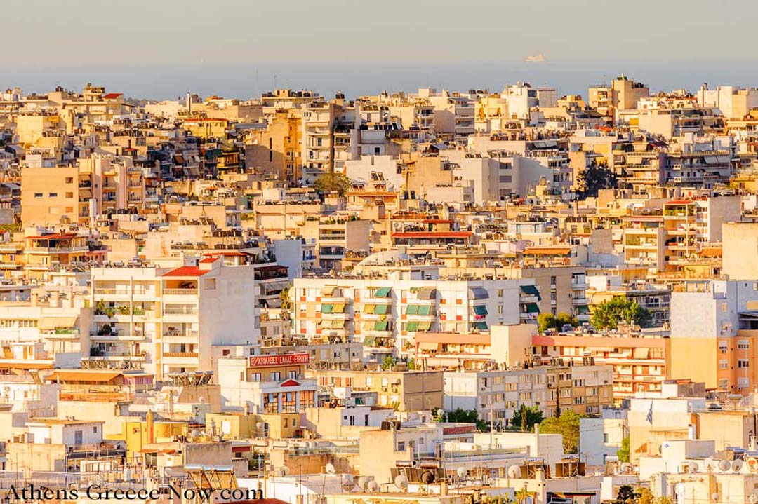 Sun-splashed landscape of Buildings in Athens Greece