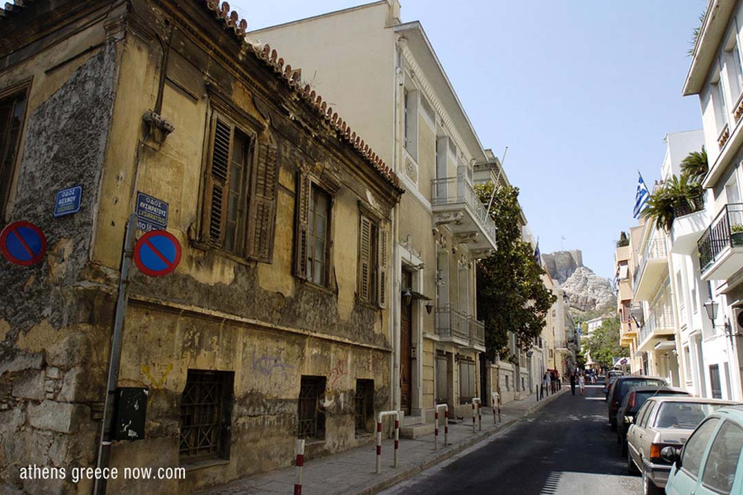 View of Athens Greece street with Acropolis in far distance