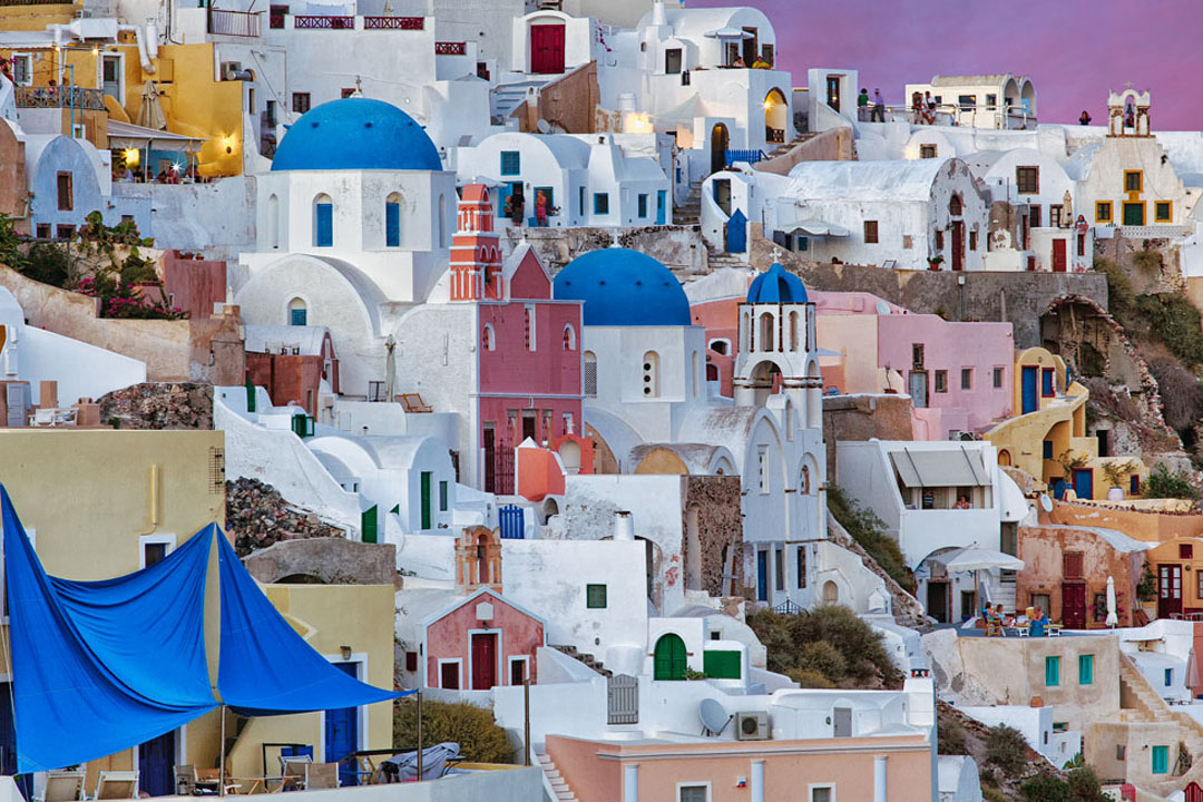 Colorful homes on island of Santorini also called Thira