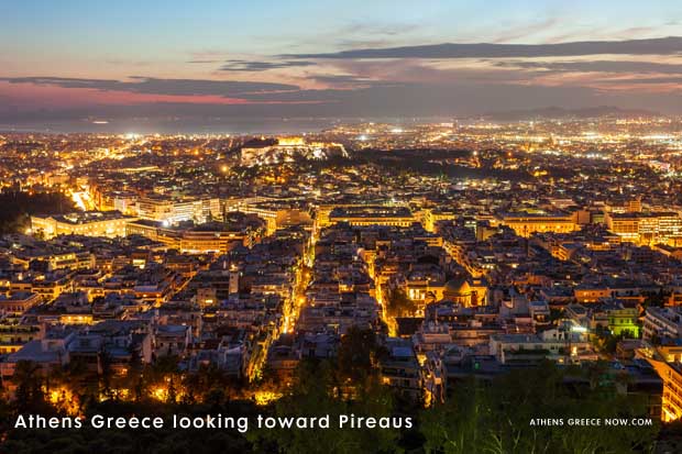 Pireaus Greece at night time with Athens