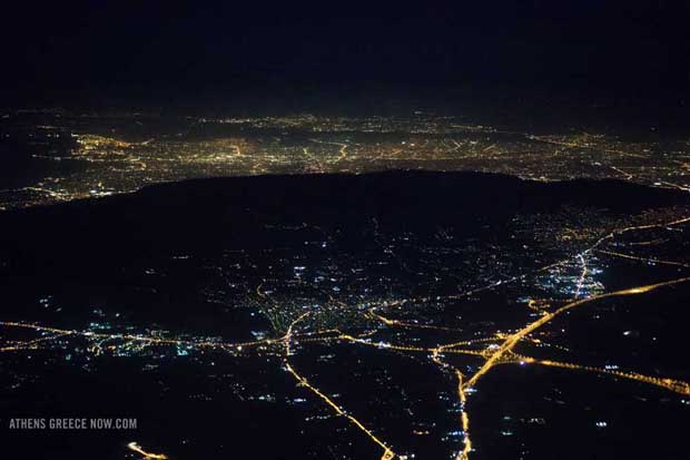 Athens Greece at night by airplane