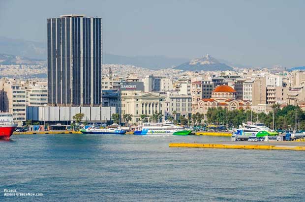 Piraeus harbor with Athens and Lycabettus in the background