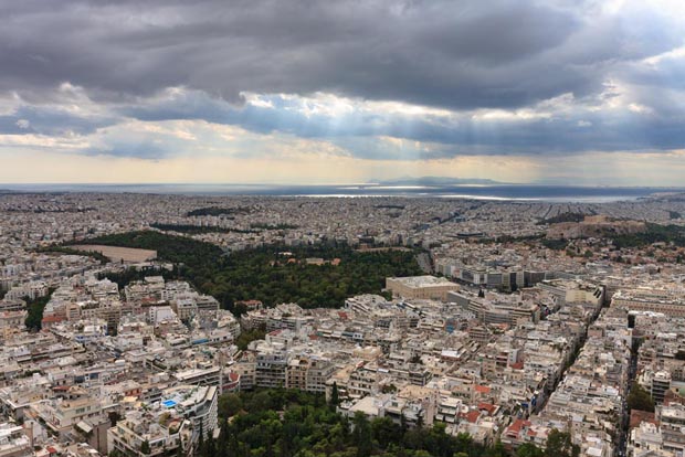 Aerial view over Athens  with Piraeus in distance