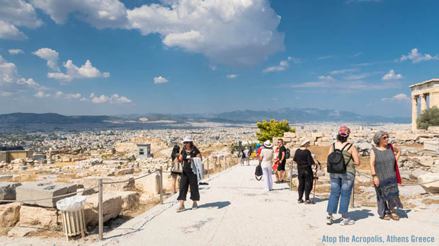 Tourist on the Acropolis Mount in Athens Greece