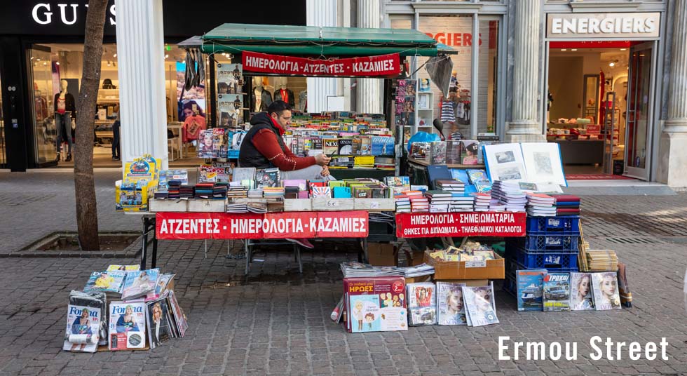 Ermou Street bookseller in winter in Athens Greece