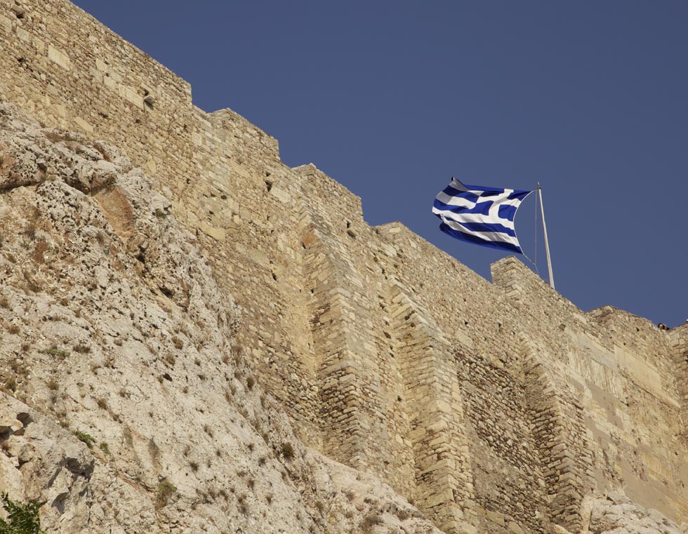 Greece Flag above Acropolis Walls