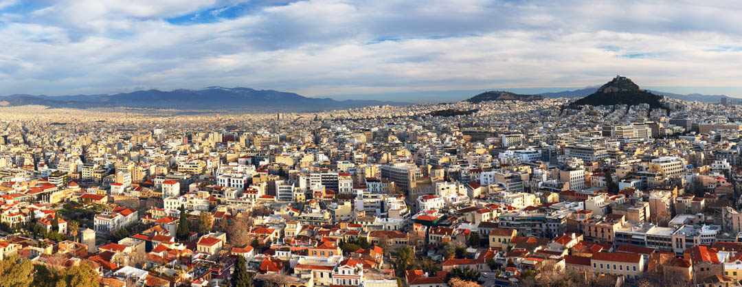 Panorama skyline view of Athens, Greece with Mount Parnitha in the background