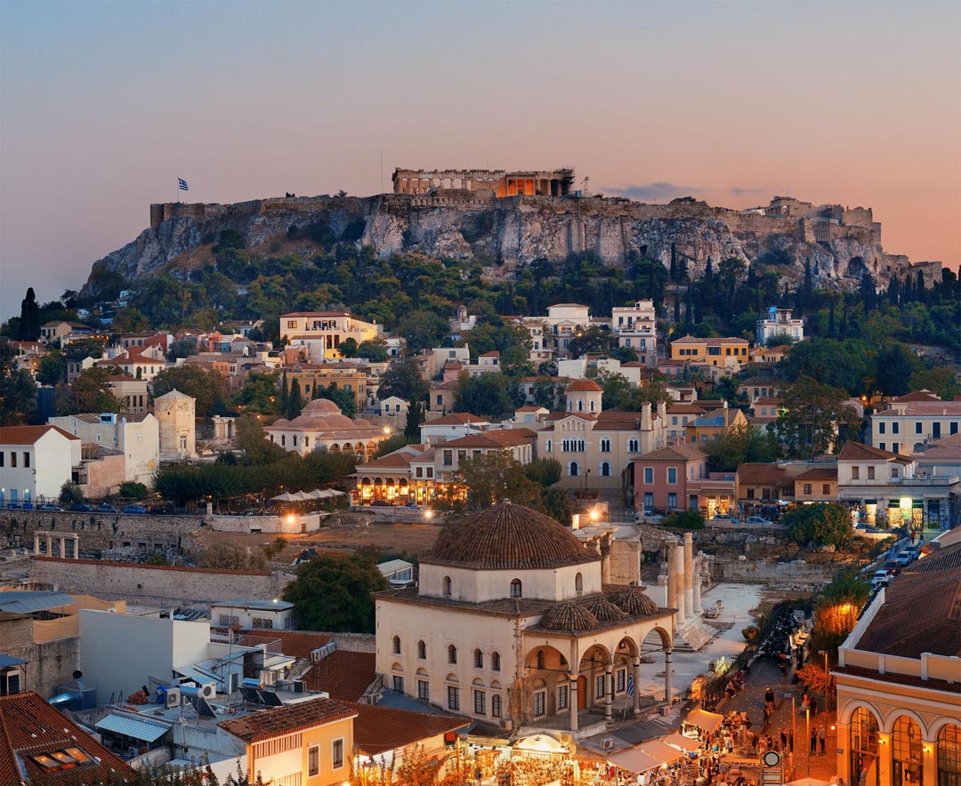 Click to see expanded and enlarged view of Parthenon and Monastiraki at night in Athens, Greece