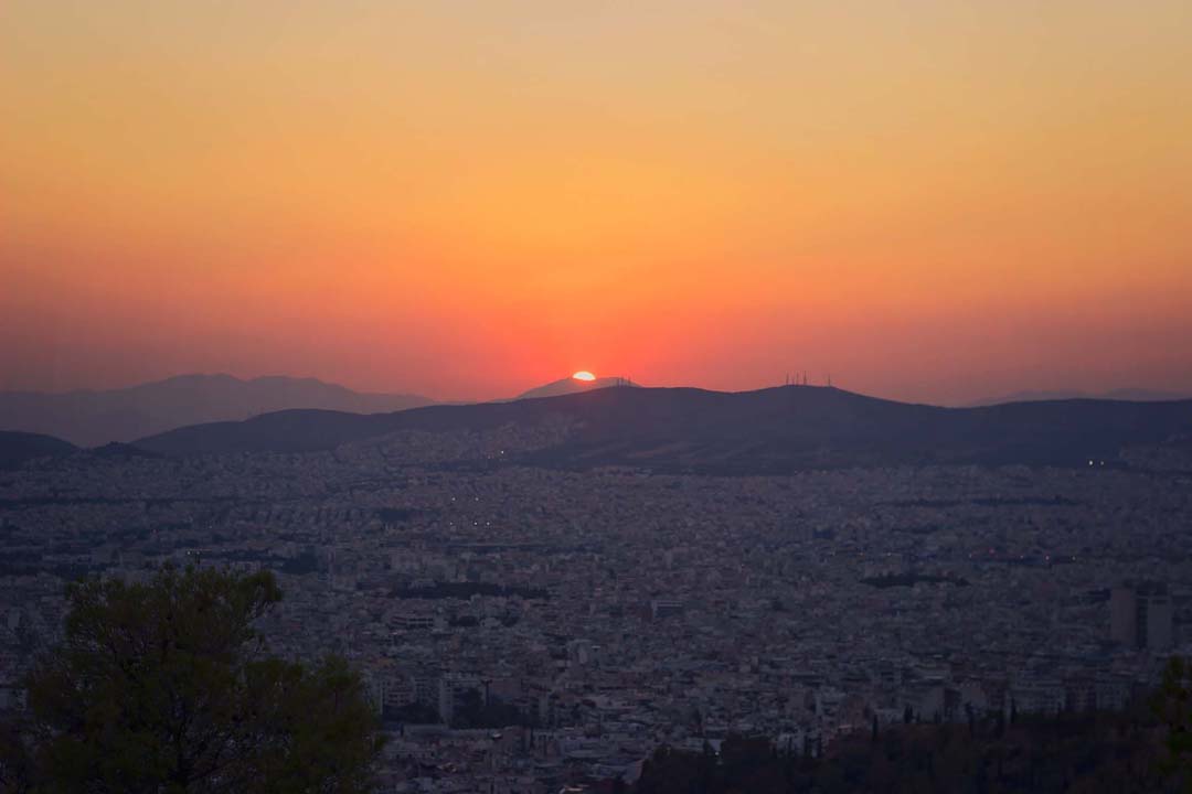 Sunset over Mount Aegaleo in Athens Greece