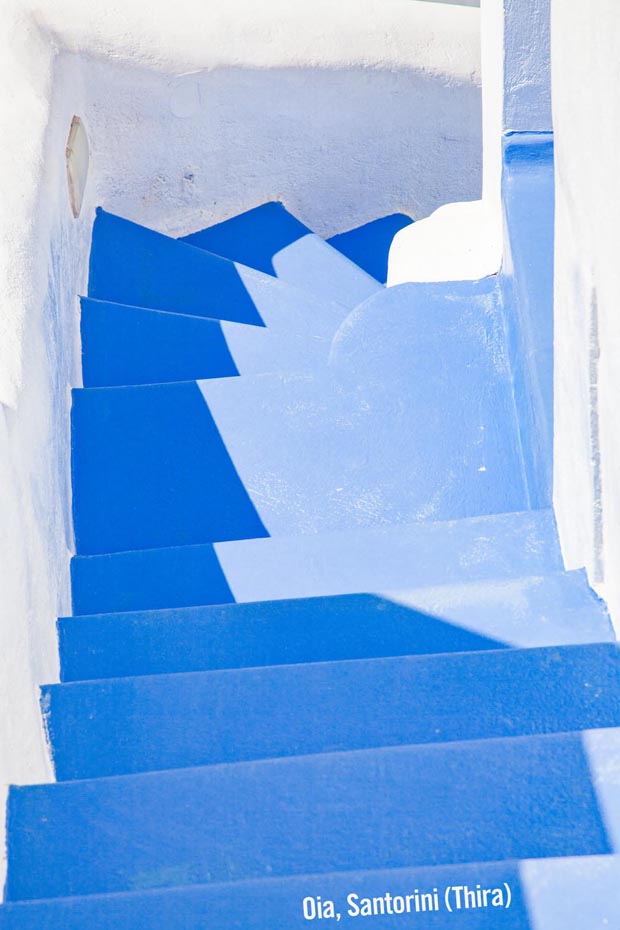 Whitewashed stairs of blue and white on Oia Santorini aka Thira Greece Whitewashed stairs of blue and white on Oia Santorini aka Thira Greece