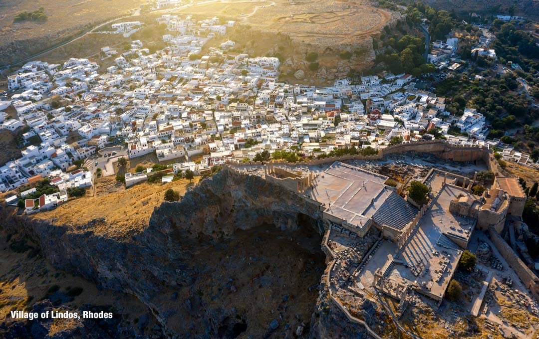Click on image to enlarge the photo - Acropolis of Rhodes Island at Village of Lindos - Aerial View from Drone Acropolis of Rhodes Island at Village of Lindos - Aerial View from Drone
